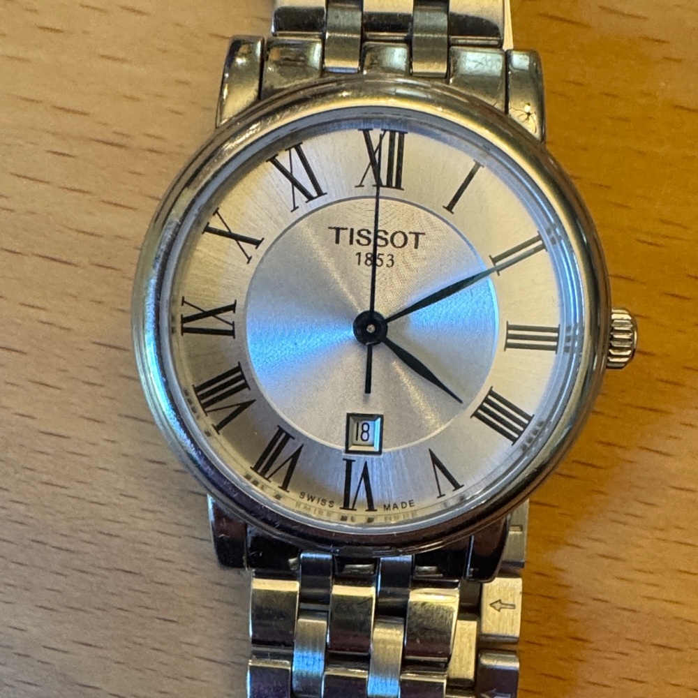 Tissot Silver Stainless Steel Roman Numeral Dress Watch